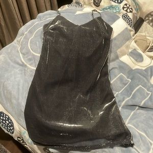 Gorgeous NWOT adjustable spaghetti strapped lined shimmery mini dress